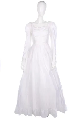 Ronald Joyce white wedding dress with ruffle train